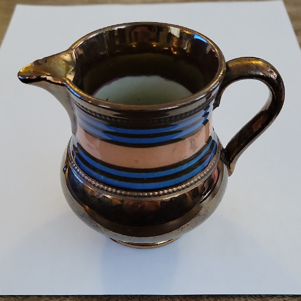 Elegant Copper and Blue Ceramic Pitcher